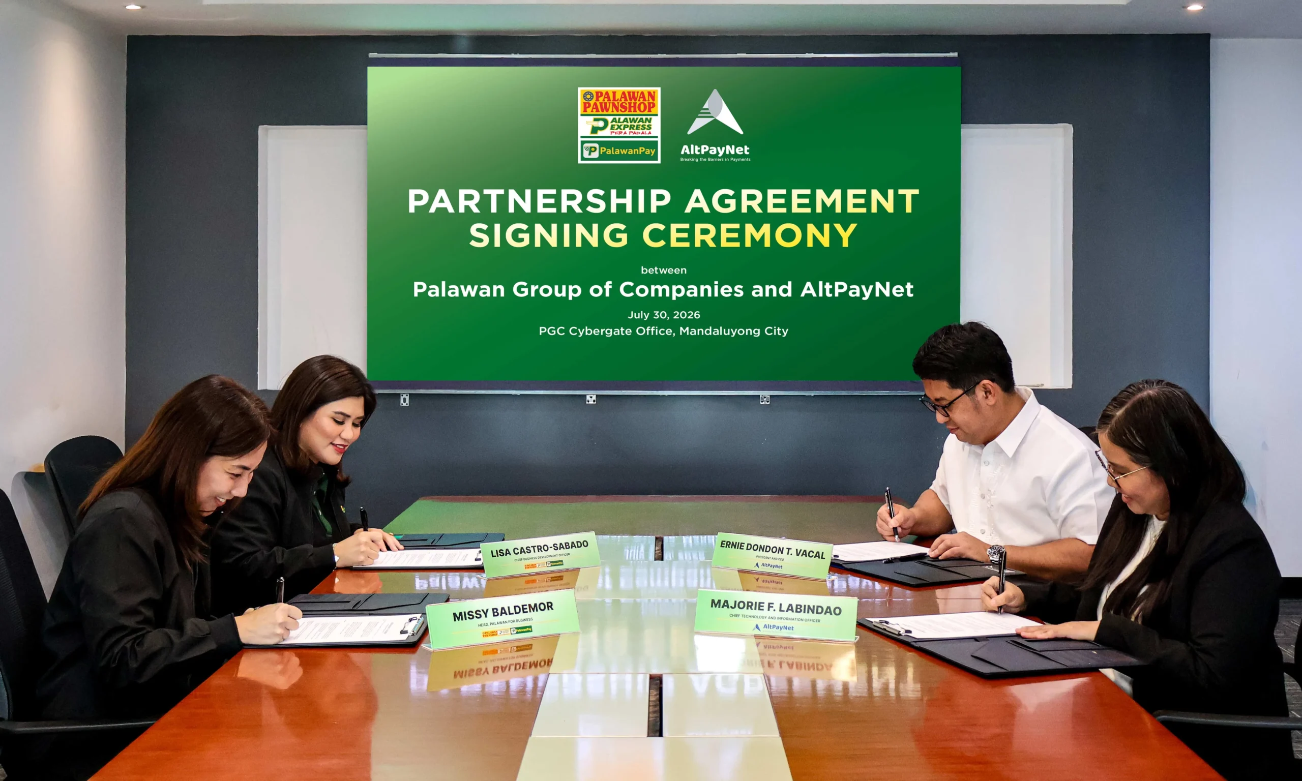 Palawan Group and AltPayNet officials signing the partnership agreement for international remittance services