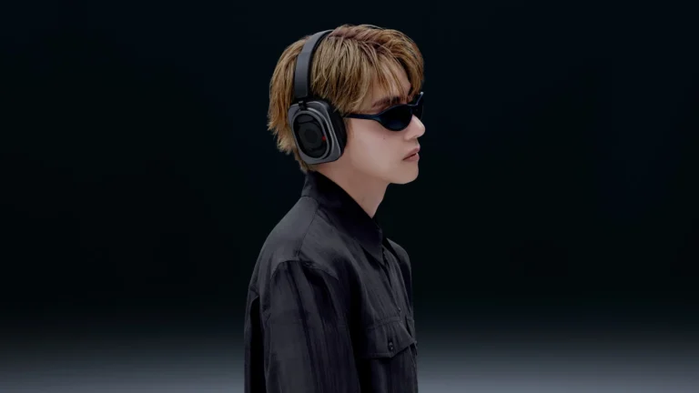 V of BTS wearing the Nothing Headphone (1) Pro in black for Nothing's new campaign