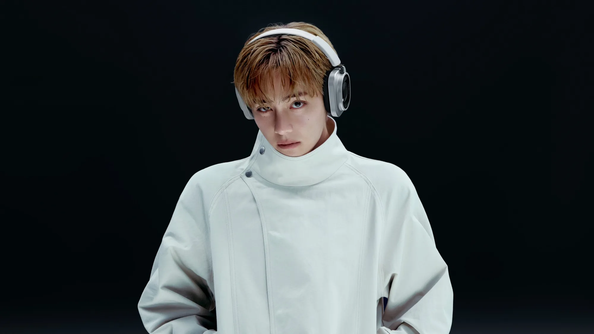 V of BTS with the Nothing Headphone (1) Pro in white, shot in Seoul for Nothing's campaign