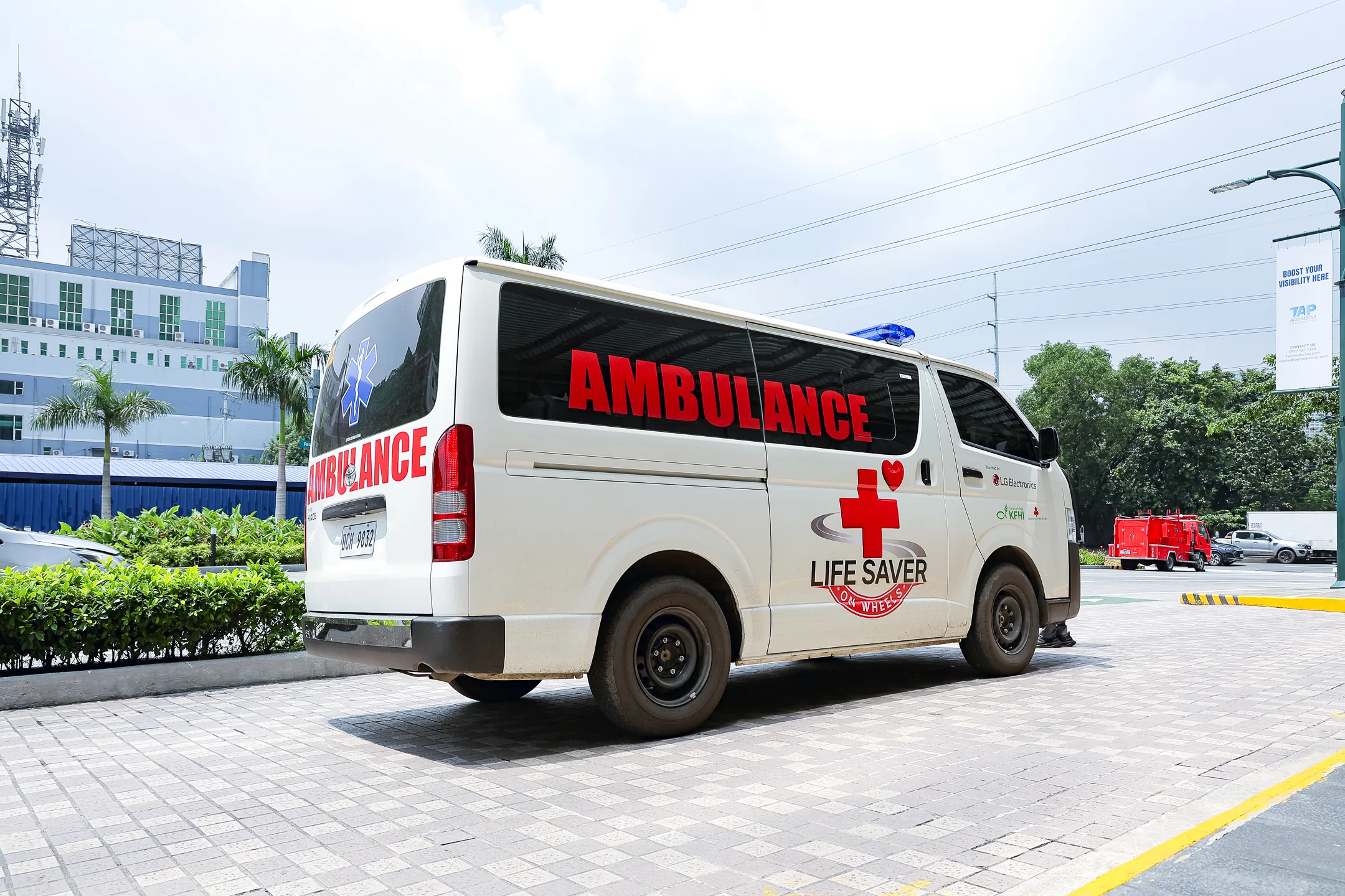 Residents of Barangay Galalan and LG Electronics Philippines representatives at the ambulance turnover