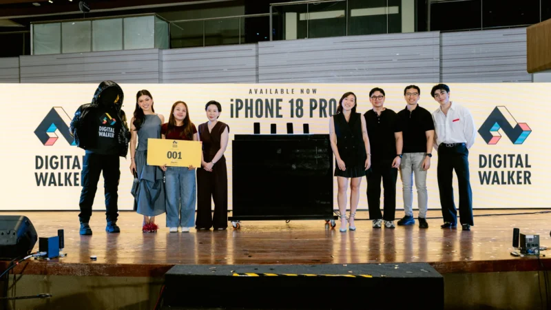 Digital Walker iPhone 18 Pro midnight launch: the first customers in line hold the 001 queue sign at Glorietta