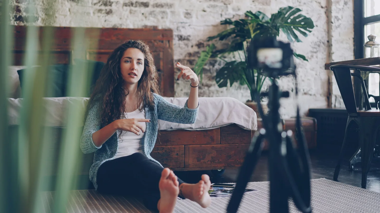 Content creator recording a video at home