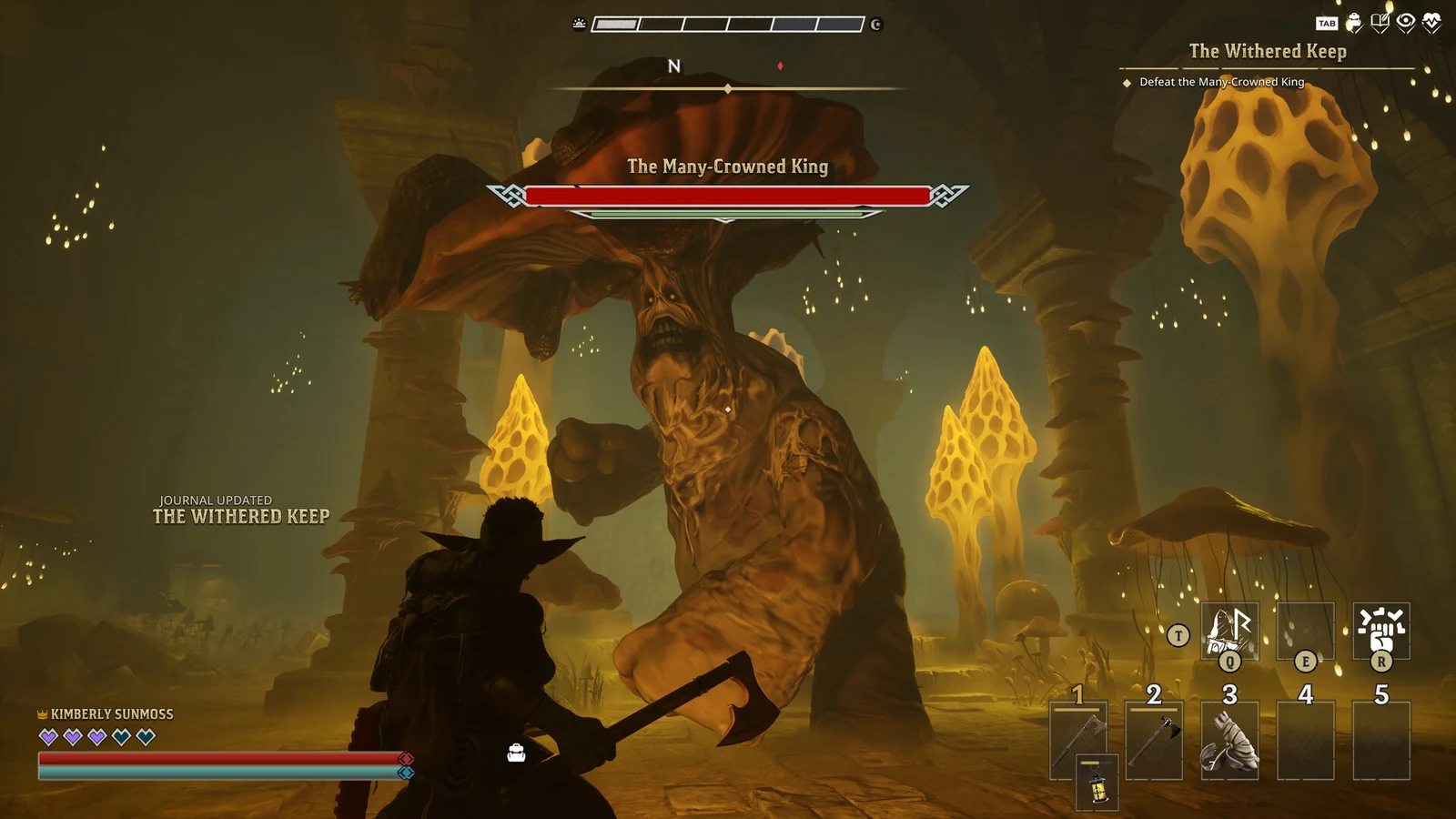 A boss encounter inside The Withered Keep dungeon in the Wyldheart demo, with the player facing a crowned enemy